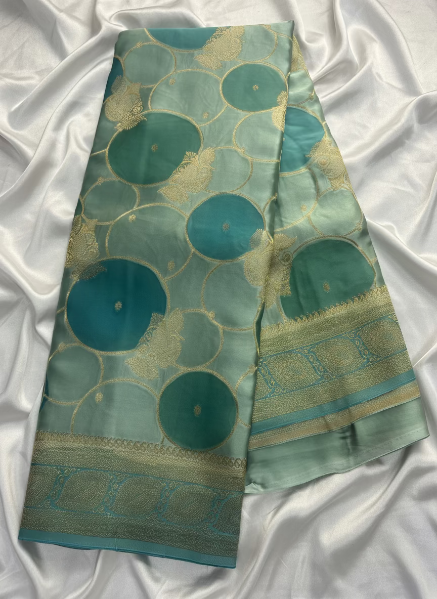 Sea Green Banarasi Russian Silk Saree with Gold Circular shaped Rangkat weaving with Golden Leaf Border- Designer Party Wear