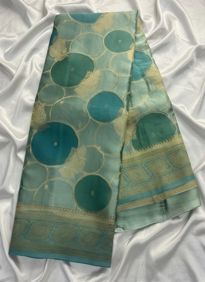 Sea Green Banarasi Russian Silk Saree with Gold Circular shaped Rangkat weaving with Golden Leaf Border- Designer Party Wear